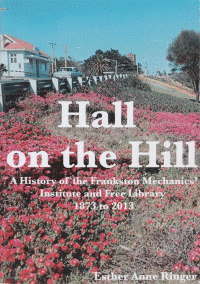 Hall on the Hill cover. Photograph of the Mechanics Hall building with pink pigface flowers in the foreground.